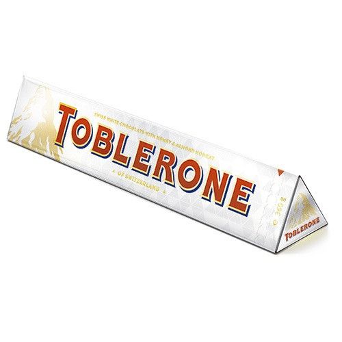 Шоколад Toblerone White Chocolate With Honey And Almond Nougat 100g 5335 фото