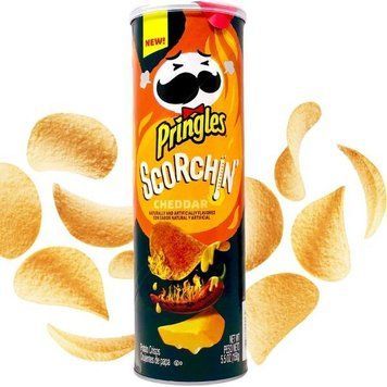 Чіпси Pringles Scorchin Cheddar 158g (Прим'ята упаковка) 2452 фото
