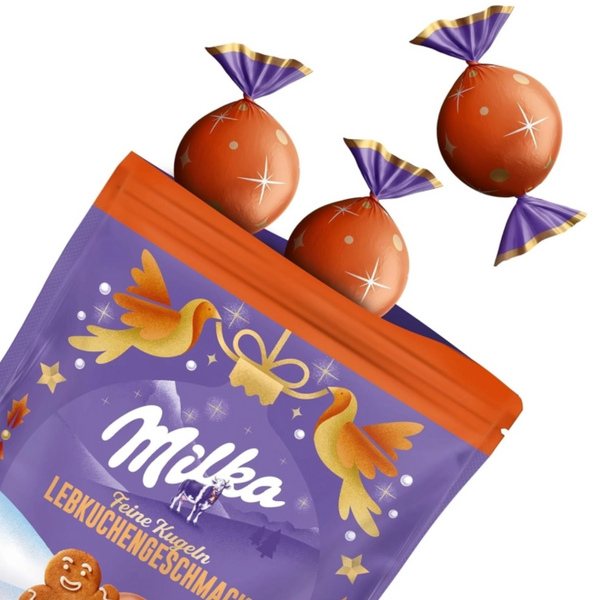 Шоколадні цукерки Milka Feine Kugeln Lebkuchen Geschmack 90г 7782 фото