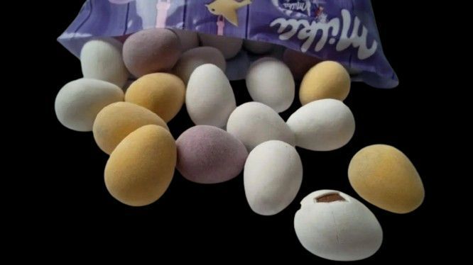 Великодні шоколадні міні-яйця Milka Mini Eggs, 31.6г 6614 фото