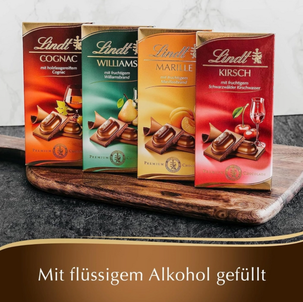Молочный шоколад с абрикосовым ликером Lindt Marille Premium Chocolate 100г 7843 фото