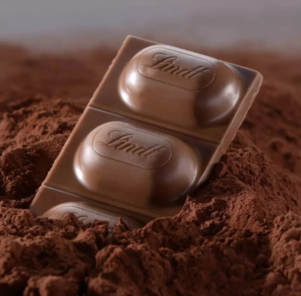 Молочный шоколад с абрикосовым ликером Lindt Marille Premium Chocolate 100г 7843 фото