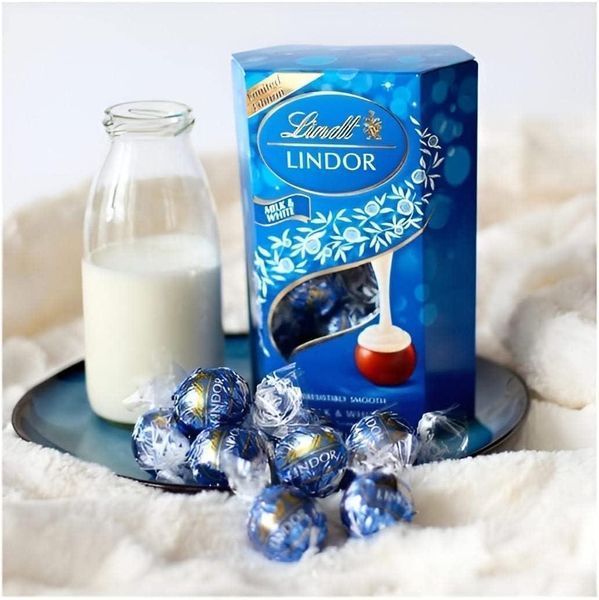 Шоколадні цукерки Lindt Lindor Milk White Limited Edition, 200г 6510 фото