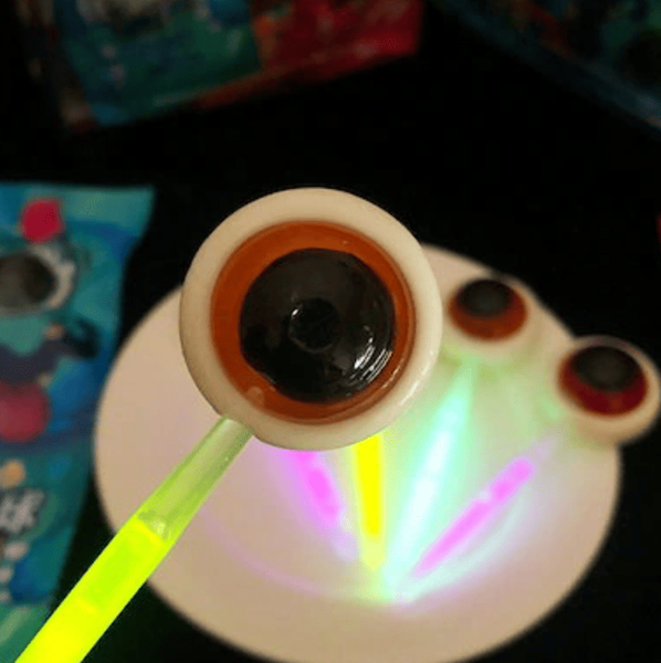 Конфета-леденец SSNS Halloween Glow Bone Eye Lollipop Candy со светящимся эффектом 10г 9308 фото
