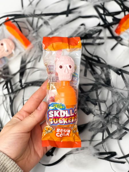 Льодяник з кислою рідиною Halloween Skull Suckers - кола 40g 3007 фото