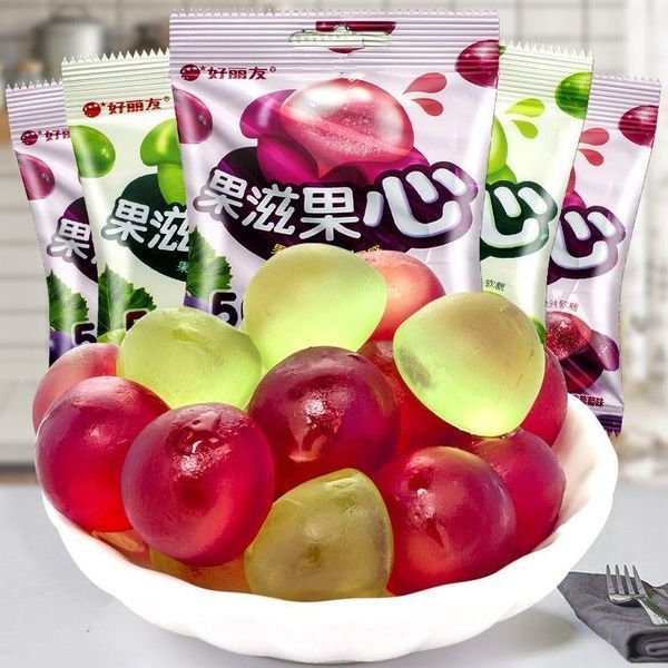 Китайські жувальні цукерки Orion Purple Grape Flavored Filled Soft Candy Виноград 70г 8676 фото