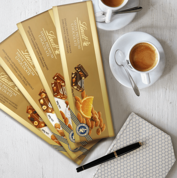 Шоколад Lindt Swiss Premium Dark Almond Orange 300г 9987 фото