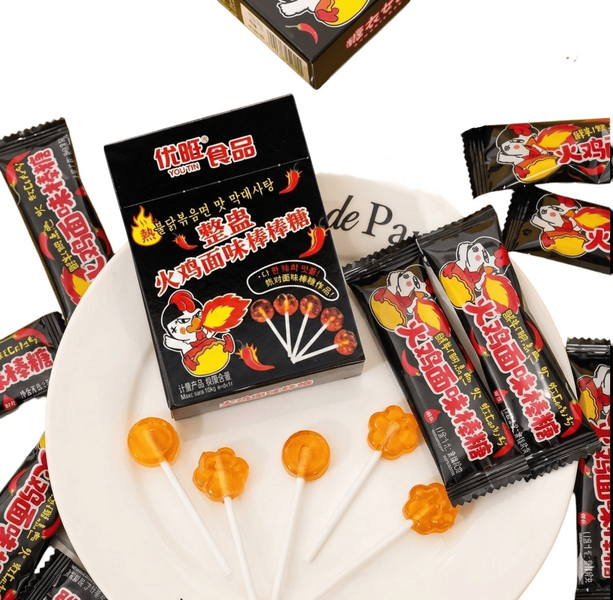 Гострі льодяники на паличці Yowang Foods зі смаком корейської локшини Buldak 25г (4 льодяники) 10982 фото
