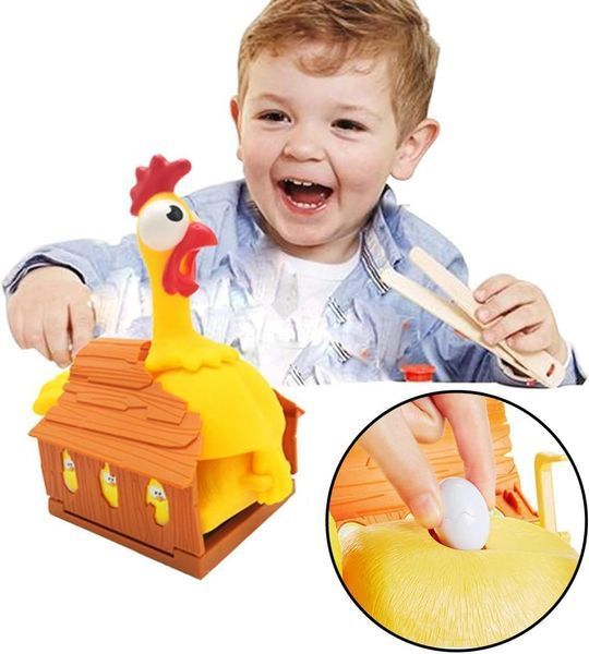 Настільна гра Chuck Screaming Egg laying Chicken Шалена курка з яйцями 9302 фото