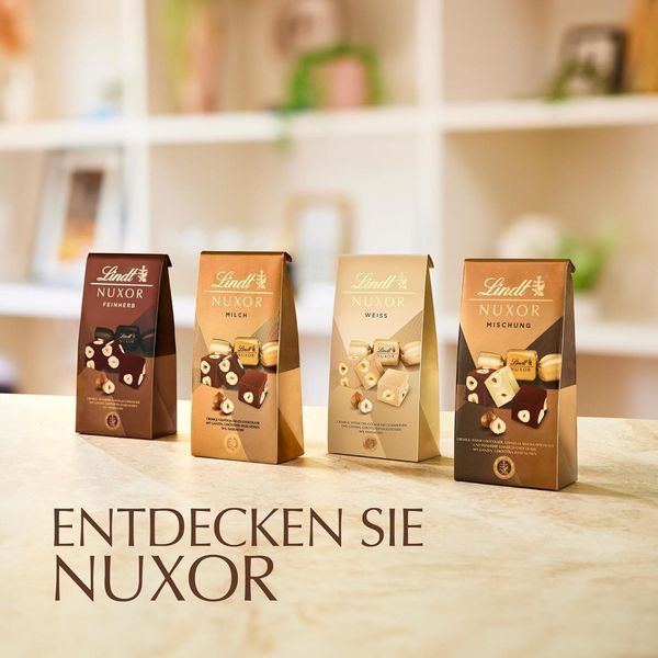 Шоколадні цукерки Lindt Nuxor Mischung 103г 10583 фото