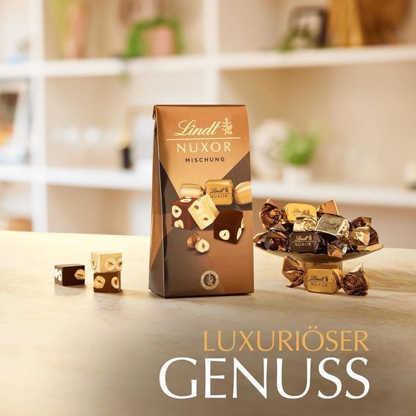 Шоколадні цукерки Lindt Nuxor Mischung 103г 10583 фото
