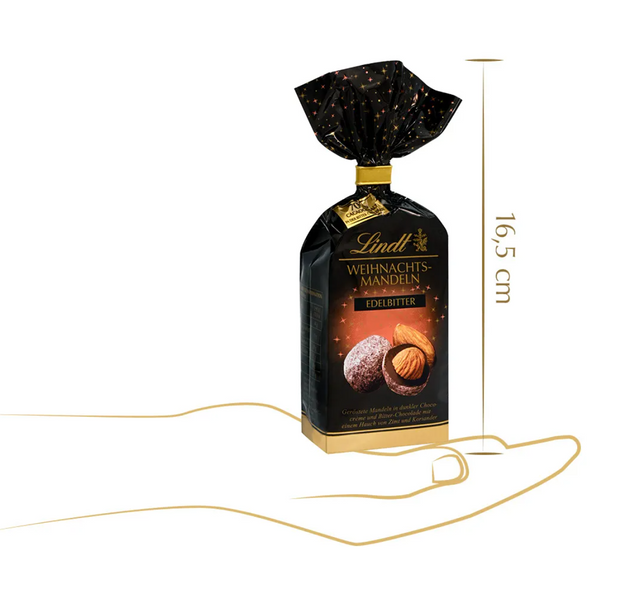 Шоколадные конфеты с миндалем Lindt Weihnachtsmandeln Edelbitter 100г 7876 фото