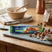 Шоколадний батончик Lindt Ganze Haselnuss Milch Chocolate Bar 35г