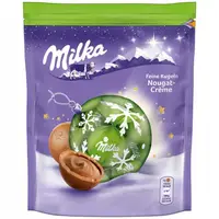 Новорічні цукерки Milka Bonbons Feine Kugeln Nougat-Creme 90 g