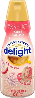 Вершки для кави International Delight Paris Hilton Sweet and Spicy Coffee Creamer 946мл (11519) фото 1